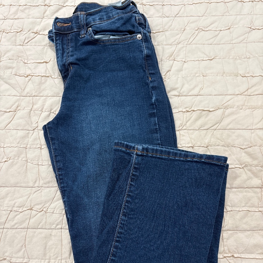 Dark wash cropped boot cut jeans
